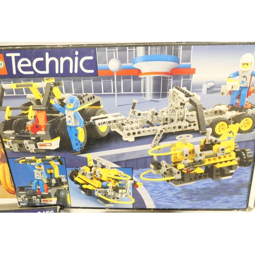 2251 - A box of assorted Lego Technic model kits, some part assembled