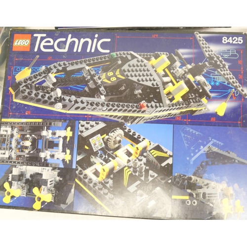 2251 - A box of assorted Lego Technic model kits, some part assembled