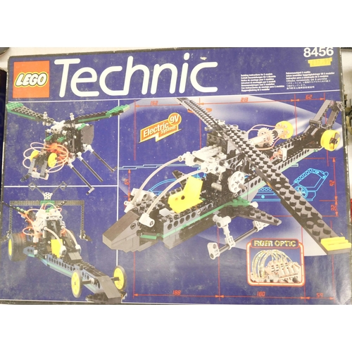 2251 - A box of assorted Lego Technic model kits, some part assembled