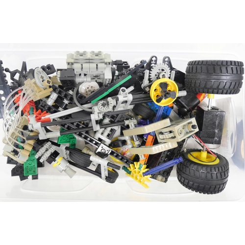 2251 - A box of assorted Lego Technic model kits, some part assembled