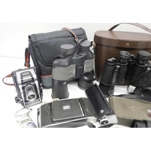 2252 - A box of camera and binoculars including Bolex cini-camera & Number 1 Autographic Koda Jr, etc.