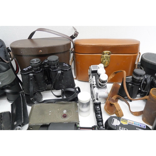 2252 - A box of camera and binoculars including Bolex cini-camera & Number 1 Autographic Koda Jr, etc.