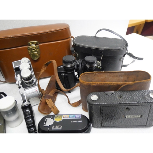 2252 - A box of camera and binoculars including Bolex cini-camera & Number 1 Autographic Koda Jr, etc.