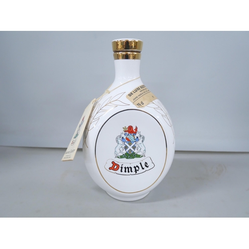 2262 - A souvenir Dimple De Luxe Scotch Whisky decanter, distilled and bottled by John Haig & Co. **PLEASE ... 