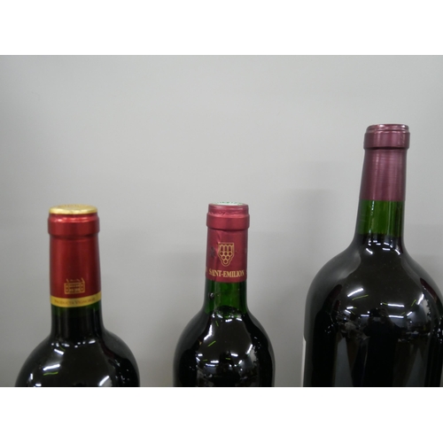 2266 - Five bottles of red wine to include Haut-Medoc 1997, Saint-Emilion 1986, Claret Bordeaux 1989, Chate... 