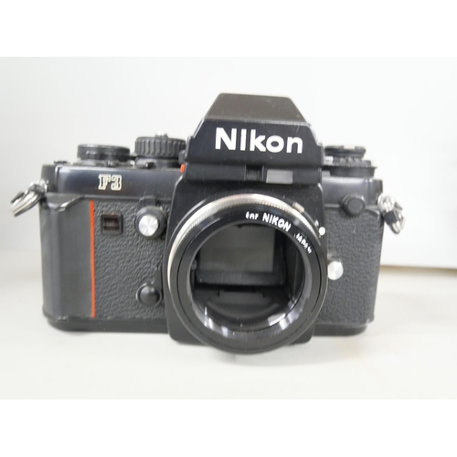 2299 - Two camera bodies, Nikon F3 and Agfa Isolette consisting camera with leather case and flash attachme... 