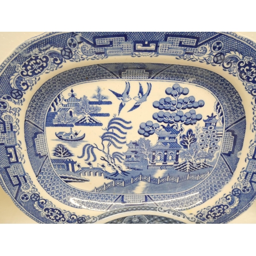 2315 - A collection of blue and white china; vegetable dish and cover, serving plates and other plates and ... 