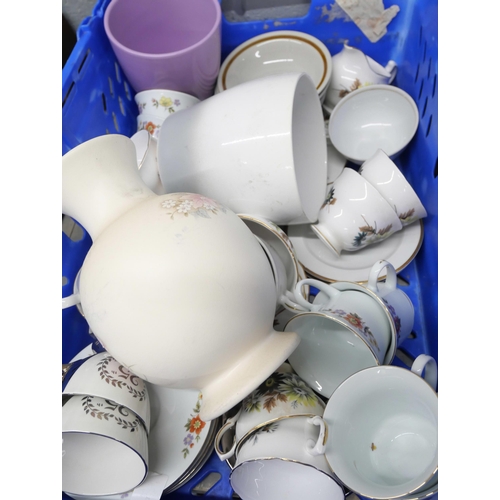 2322 - Large collection of assorted china to include teacups and saucers, teapots, vases, plates, dishes, e... 