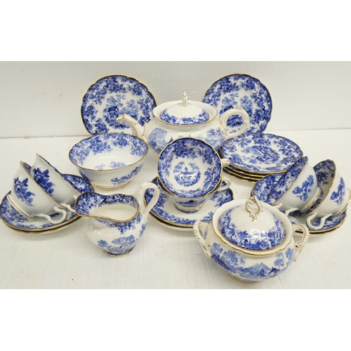 2325 - A Minton blue and white Genevese pattern tea set, six setting, sugar basin lid a/f and teapot a/f, a... 