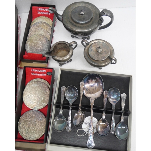 2338 - A collection of plated ware, three piece tea service, coasters, plates and cups and a John Mason of ... 