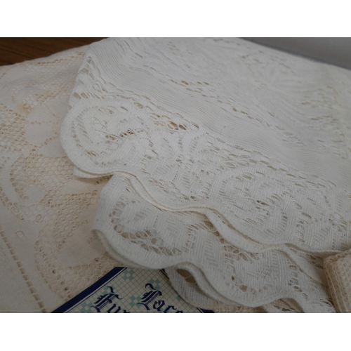 2342 - Eleven assorted panels of genuine Nottingham lace, one stained