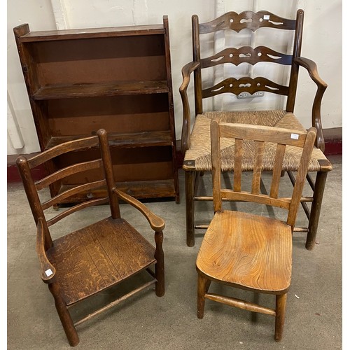 305 - A stained pine open bookcase, two child's chairs and one other chair