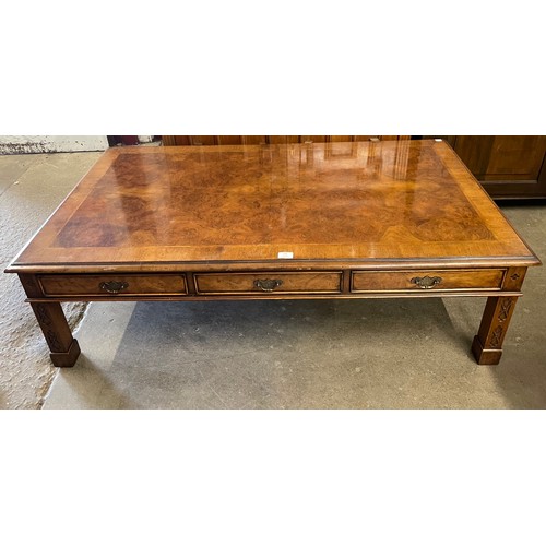 308 - A Regency style walnut three drawer coffee table