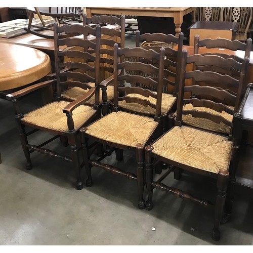 298 - A set of six early 20th Century beech and wicker seated ladder back chairs