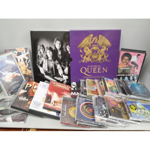 2133 - Music; Queen 40 years of Queen book, (special commemorative edition in purple), CDs and videos, Wake... 