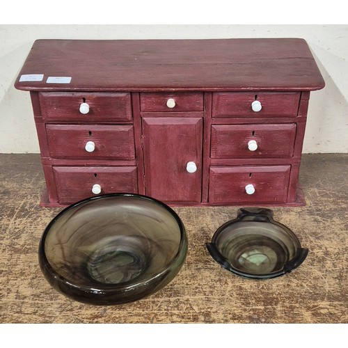 367 - A stained pine table top cabinet, a studio glass fruit bowl and ash tray