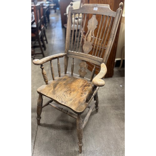 236 - A Victorian elm and beech farmhouse armchair