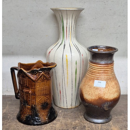 398 - Two stoneware pottery vases and a hunting scene jug