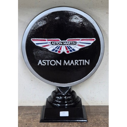 403 - A large painted metal Aston Martin motif