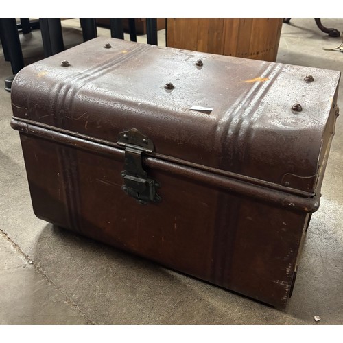 309A - An early 20th Century metal steamer trunk