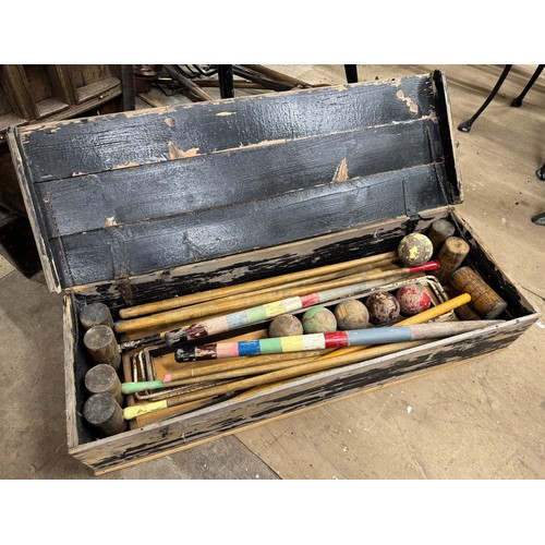 331 - A vintage cased croquet set