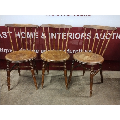 161A - A set of three Victorian beech penny seat kitchen chairs