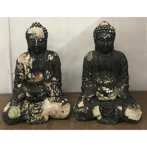 404 - A pair of painted fibreglass garden figures of seated deity's