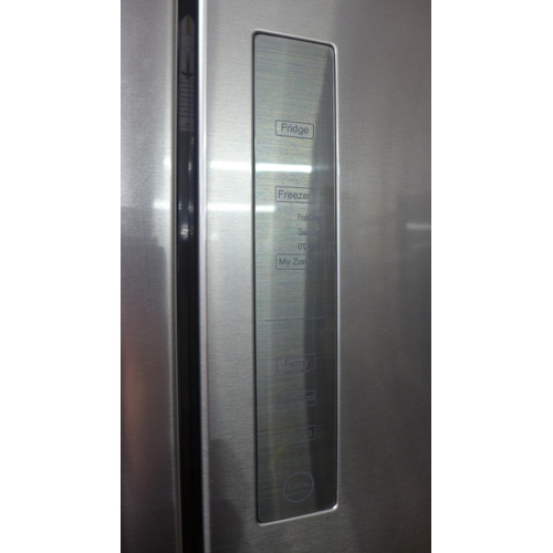 5128 - A Haier stainless steel fronted twin door fridge freezer