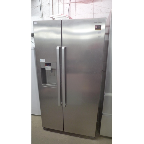 5129 - A Samsung twin door brushed steel American style fridge freezer with water and ice dispenser