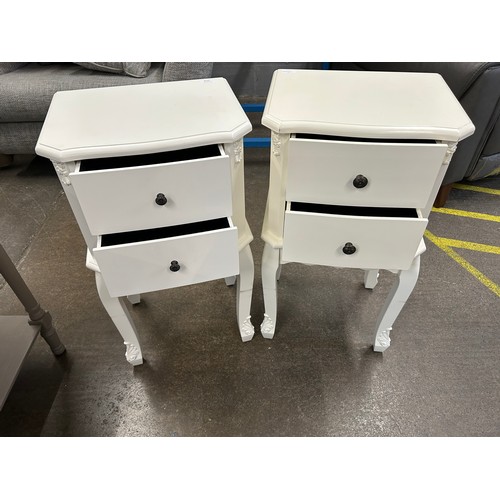 3219 - A pair of white two drawer bedside tables