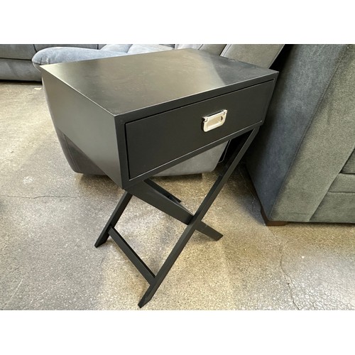 3224 - A pair of black single draw bedside tables