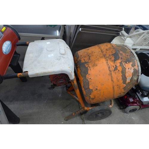 A Bell mini mix 150 petrol cement mixer