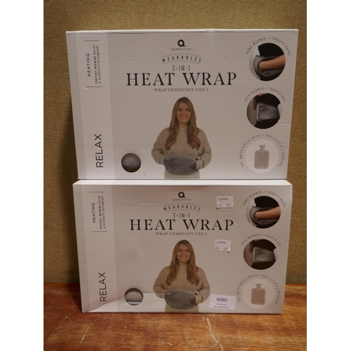 6080 - Two Aroma 3-in-1 heat wraps (354-521,522) *This lot is subject to VAT