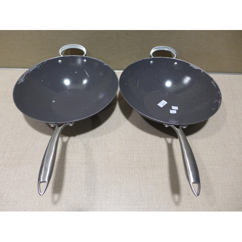 6294 - Two Nordic Ware woks    (354-539,540) *This lot is subject to VAT