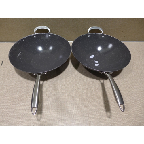 6295 - Two Nordic Ware woks     (354-537,538) *This lot is subject to VAT