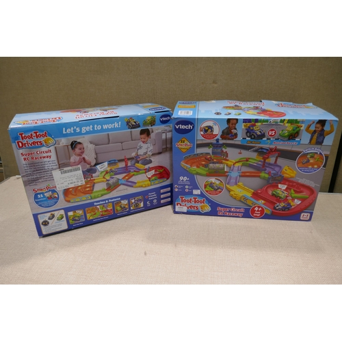 6350 - Power puppy/kitty remote control toy and two Toot Toot Drivers raceways  (354-129,404,405) *This lot... 