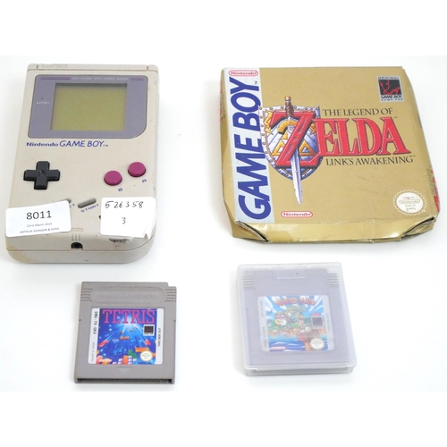 8011 - An original Nintendo Gameboy with 3 games, Tetris, Wario Land Super Mario Land 3 and The Legend of Z... 