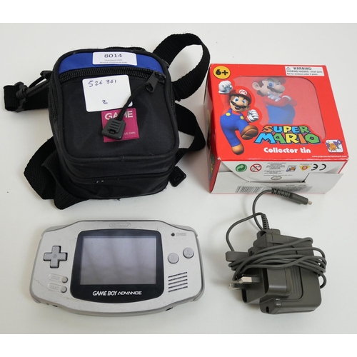 8014 - A Nintendo Gameboy Advance with charger, Yoshi's Island game and a 