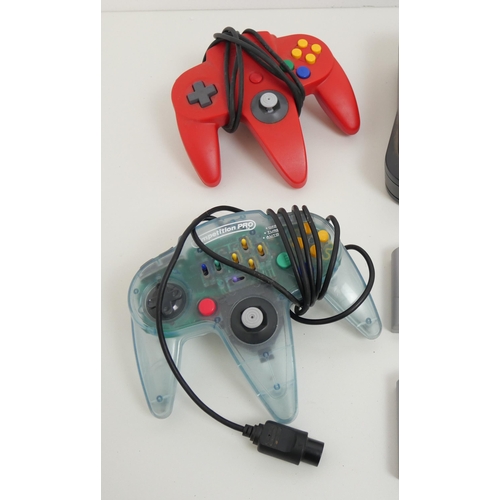 8018 - A Nintendo 64, 2 controllers, (1 original, 1 competition Pro) and 5 games, Mario Kart 64, Super Mari... 