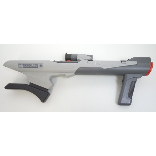 8026 - A Nintenso Super NES model SNSP-013 Nintendo scope transmitter rifle