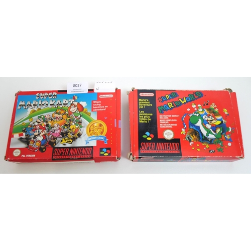 8027 - Two boxed Super Nintendo games including Super Mario World and Super Mario Kart