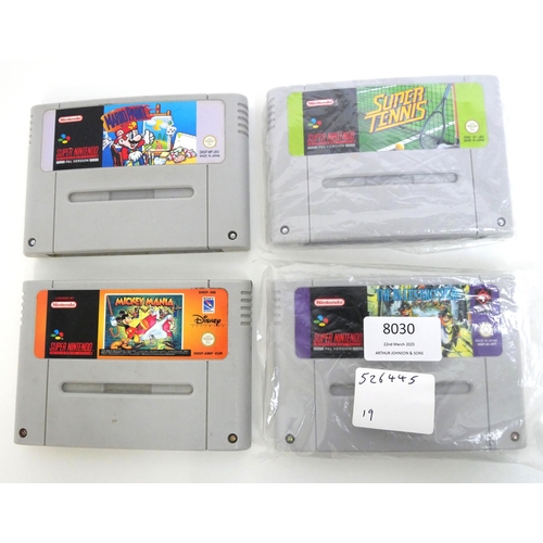 8030 - Four loose Super Nintendo games cartridges including Mario Paint, Super Tennis, Mickey Mania and The... 