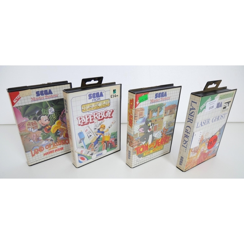 8033 - A selection of complete in box Sega Master System games including Laser Ghost, Tom and Jerry The Mov... 