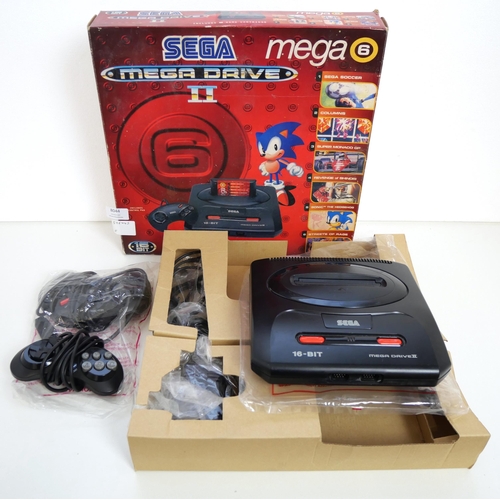 8044 - A boxed Sega Mega Drive II games console in 'Mega 6' packaging - comes with two control pads, power ... 