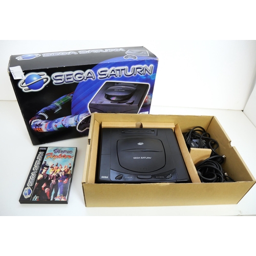 8045 - A boxed Sega Saturn games console complete with control pad, scart lead, power supply and a copy of ... 