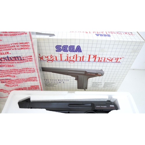 8047 - A boxed Sega Master system/power base console unused and complete with Sega light Phaser unused in b... 