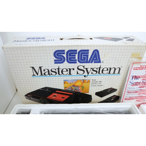 8047 - A boxed Sega Master system/power base console unused and complete with Sega light Phaser unused in b... 