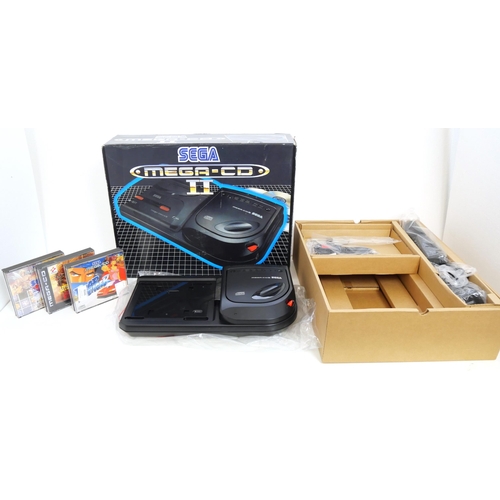 8048 - A boxed Sega Mega CDII with games including Road Avenger, Lethal Enforcers II Gun Fighters and Sega ... 