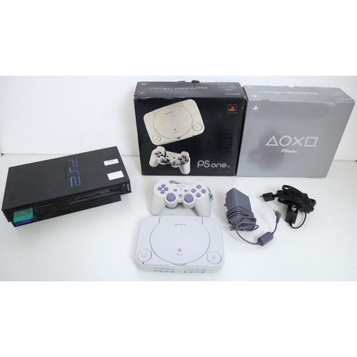 8056 - A boxed Sony Playstation (PS One) model SCPH-102B - complete with original packaging, console, analo... 