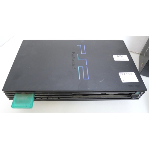 8056 - A boxed Sony Playstation (PS One) model SCPH-102B - complete with original packaging, console, analo... 